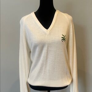 Elegant Cream V-Neck Sweater with flower emblem